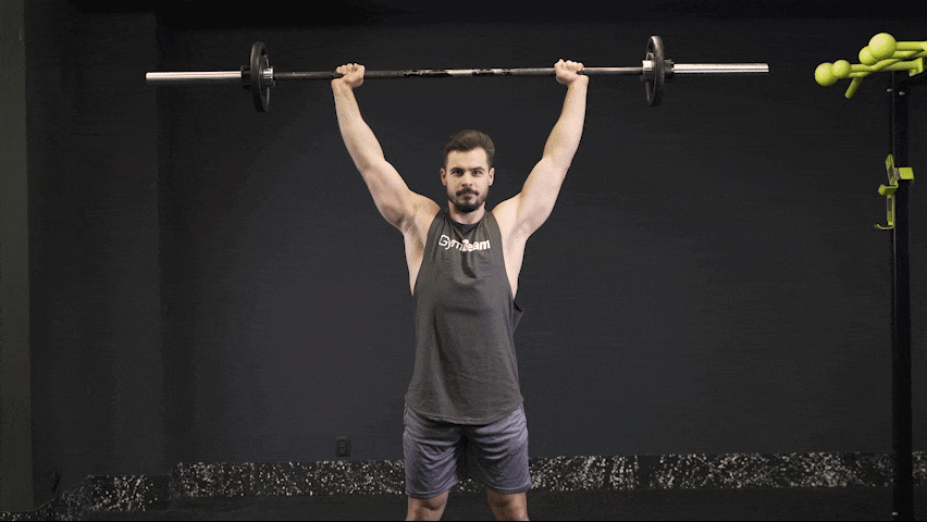 So führt man Standing Barbell Press richtig aus