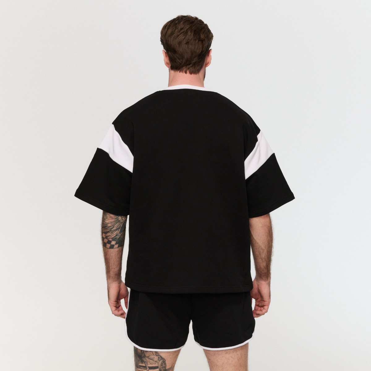 Premium Heavyweight Varsity T-Shirt in Black - GymBeam