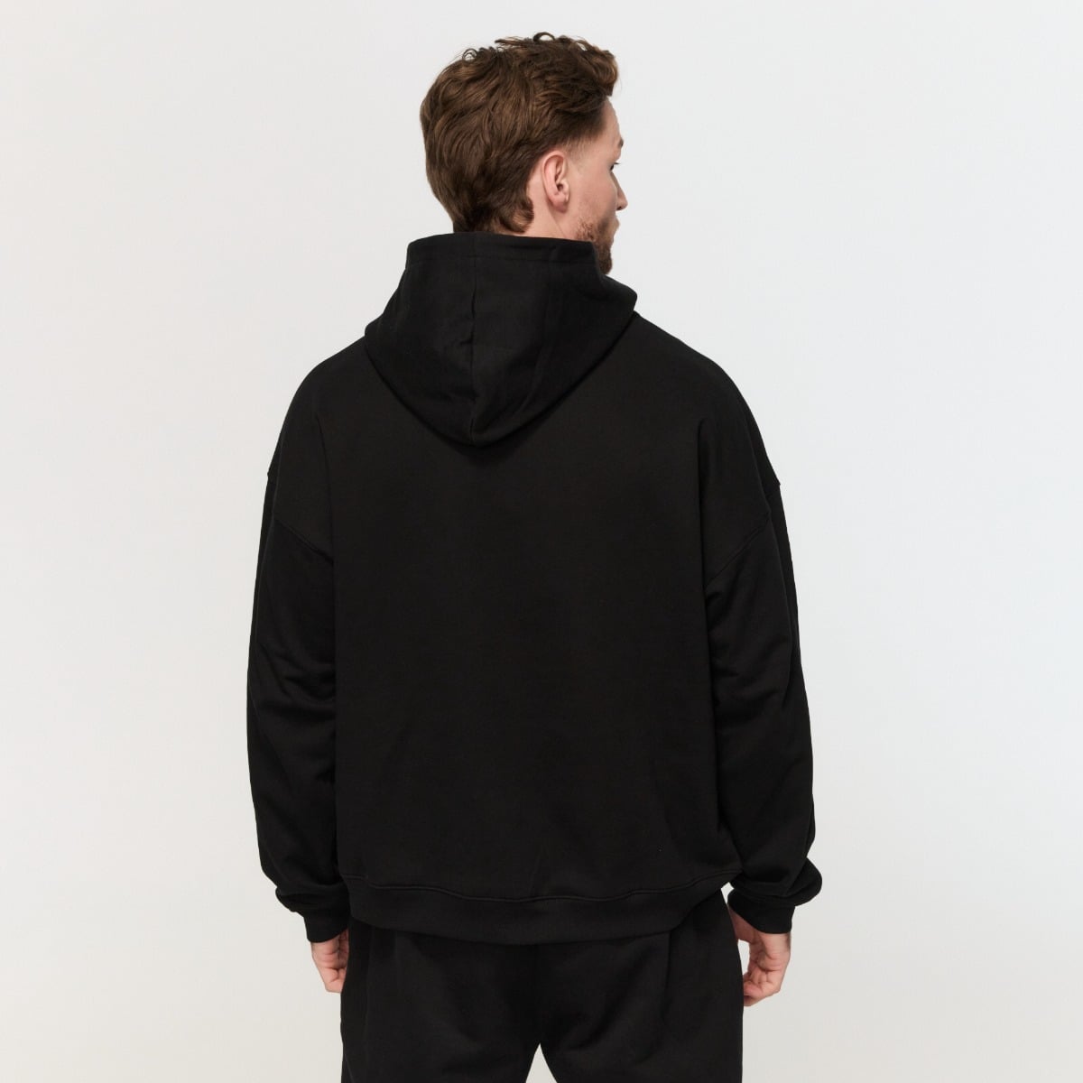 Varsity Hoodie in Black - GymBeam